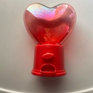 Small red heart shape candy dispenser